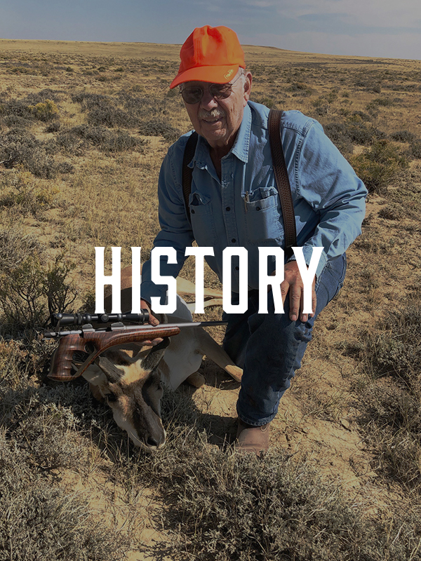 image of an older man hunting with "History" written on top